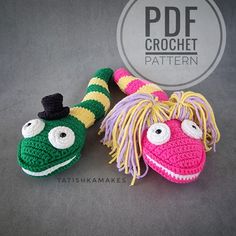 two crocheted slippers with different colored yarns on them, one has a face and the other has a mouth