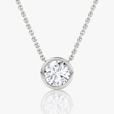 The Bezel Solitaire Necklace combines vintage-inspired detail and modern appeal together for a look that’s timelessly elegant. Jewellery Showroom, Bezel Necklace, Bespoke Rings, Solitaire Necklace, Modern Engagement Rings, Solitaire Necklaces, Accessories Jewelry Necklace, Diamond Pendant Necklace, Drop Necklace