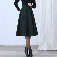 "More color: https://etsy.me/3NgO20M ★★ FEATURES * Wool skirt * Polyester lining * Two side seam pockets * Right zipper closure * pleated detail * Plus size full skirt * A Line Skirt * Perfect for Winter, autumn, spring * Dry clean ★★ The model is 170 cm (5′ 7″) tall with a 80 cm (31.5\") bust, 66 cm (26\") waist. She is wearing the green wool skirt in size XS. ★★ Bespoke Order Service If you Request other color Request the length Your height is not between 155 cm- 172 cm Your weight is over 75 Chic A-line Winter Skirt, Chic Winter A-line Pleated Skirt, Winter Wool A-line Skirt, A-line Skirt In Solid Color For Fall, Solid Color Skirt For Winter Workwear, Solid Color Winter Workwear Skirt, Fitted Solid Pleated Skirt For Fall, Fitted Full Skirt In Solid Color, Fitted Solid Color Pleated Skirt For Fall