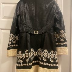 This Is A Size 6, And Is In Great Shape. All Of The Embroidery Is Impeccable, It Is Black And Cream Colored. It Is Very Flattering. Elegant Winter Outerwear With Floral Embroidery, Elegant Floral Embroidered Winter Outerwear, Luxury Spring Outerwear With Floral Embroidery, Luxury Long Sleeve Outerwear With Floral Embroidery, Designer Embroidered Outerwear For Fall, Designer Embroidered Fall Outerwear, Fitted Cream Embroidered Outerwear, Designer Embroidered Fitted Outerwear, Cream Long Sleeve Outerwear With Floral Embroidery