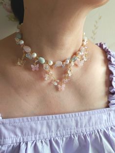 Transform into an ethereal butterfly with this Dream Butterflies Necklace. Crafted with pastel blue and pink morganite beads, lustrous freshwater pearls, and romantic butterfly and flower charms, this beautiful necklace is a must-have for butterfly lovers. 🍃Fairytale vibe with the pastel pink and blue beads and butterfly charms. 🍃Handcrafted with morganite beads, freshwater pearls, acrylic beads, glass beads and gold-plated findings. 🍃All variations come with a 5cm extender. Pink Pearl Beaded Necklace, Handmade Pink Butterfly Necklace, Butterflies Necklace, Ethereal Butterfly, Ethereal Romantic, Ethereal Jewelry, Necklace Fairy, Pop Jewelry, Fairy Wedding