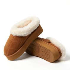 Trust us: they're as cozy as they look. With genuine shearling offering all over comfort and genuine suede providing proven indoor/outdoor durability, these clogs are a must for relaxing anytime, anywhere. Adorned with quilted details and a plush cuff, you're sure to stay cozy with these memory foam clogs. Comfortable Winter Mules With Suede Lining, Winter Suede Clogs With Textured Footbed, Brown Winter Slippers With Plush Lining, Brown Textured Winter Slippers, Casual Winter Shearling Mules, Brown Winter Slippers With Textured Footbed, Cozy Winter Indoor Clogs, Cozy Indoor Winter Clogs, Winter Suede Slippers With Cushioned Footbed