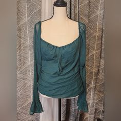 This Waye Blouse Is A Shimmering Green That Gathers Around The Waist, Has A Zipper Closure On The Side, And Runched Sleeves And Back. Love This Color! Flowy Long Sleeve Tops For Night Out, Flowy Long Sleeve Party Tops, Green Ruched Top For Night Out, Elegant Green Ruched Top, Memorial Board, Off Shoulder Ruffle Top, White Cold Shoulder Top, Simply Southern Shirts, Sheer White Blouse