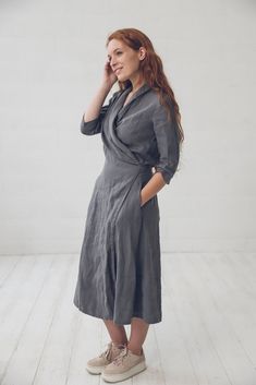 "DETAILS * Long linen wrap dress * With two side pockets and 3/4 length sleeves * Shawl collar dress with belt * Elegant, feminine and stylish choice for work or other occasion * Made from soft wash medium weight (185 g) 100 % European linen fabric * Height of the model is 165 cm (5′ 5″) and she is wearing dress in size S and solid gray color * Please choose desired color and size on the right * Product number: D07 CARE LABEL * machine wash gentle (40 C/104 F) * dry gentle on low heat * wrinkles Elegant Dress With 3/4 Sleeves And Pockets, Elegant Dresses With Pockets And 3/4 Sleeves, Elegant Dress With Pockets And 3/4 Sleeves, Elegant 3/4 Sleeve Dress With Pockets, Elegant Half Sleeve Dress With Pockets, Fitted Dress With Pockets And 3/4 Sleeves, Chic 3/4 Sleeve Dress With Pockets, Chic Dress With 3/4 Sleeves And Pockets, Belted Half Sleeve Midi Dress For Work