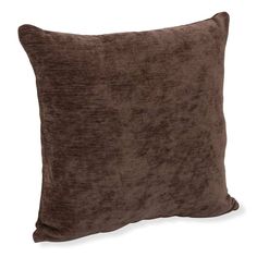 a brown pillow on a white background