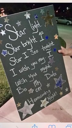 someone holding up a sign that says, star light and i wish you may be my son