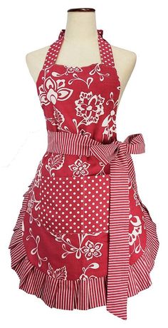 a red and white apron on a mannequin with polka dots, stripes and flowers