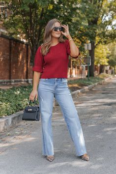 Make a bold statement with the Scarlet Red Puff Sleeve Textured Sweater, a striking blend of elegance and boho flair! With its vibrant hue and unique details, this top is perfect for adding a pop of color to your wardrobe. Designed with half puff sleeves and a charming ruffled cuff, this sweater offers a playful, feminine touch that elevates any outfit. Pair with high-waisted jeans or a flowy skirt for an effortlessly chic boho ensemble that transitions seamlessly from day to night. Chic Non-stretch Spring Knit Top, Red Knit Top For Spring, Red Knit Top For Fall, Chic Red Knit Top For Fall, Chic Red Stretch Knit Top, Trendy Red Winter Blouse, Chic Red Knit Top For Spring, Chic Red Blouse For Fall, Trendy Red Stretch Knit Top