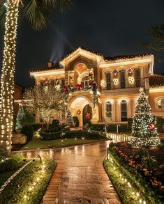 a large house with christmas lights on it