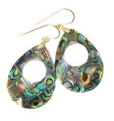 Abalone Earrings Simple abalone shell multi peacock color teardrop shaped drops Beautiful rainbow reflections and iridescence Mosaic design, mounted on white mother of pearl backing  Naturally lightweight to wear, great "go to" daily earrings Quality French earwires available in 14k solid gold, 14k gold filled or sterling silver - you choose Earrings hang 2 inches Shell size 24x35mm, natural shell pattern variations pair to pair, all great quality  Great everyday earrings Visit My eBay Store!: Spyglass Designs Please note photos show camera lighting, shadows and reflections. Jewelry comes packaged in a small colorful tie pouch. Gemstones may have been treated to improve stability, durability or appearance. Jewelry is handmade and usually hand paired, therefore there may be slight variation Daily Earrings, Abalone Earrings, Camera Lighting, Peacock Color, Mosaic Design, Shell Pattern, All Gems, Earrings Simple, Mosaic Designs