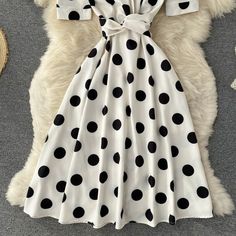 Cute polka dot v neck short dress fashion dress Fabric: blended Color: black, white Size(cm): S, M, L, XL S length 105 bust 80 waist 68 M length 106 bust 84 waist 72 White V-neck Short Sleeve Party Dress, White Short Sleeve V-neck Party Dress, White V-neck Party Dress With Short Sleeves, V-neck Polka Dot Mini Dress For Summer, V-neck Mini Dress In Polka Dot For Summer, Polka Dot V-neck Mini Dress For Summer, Casual Polka Dot V-neck Midi Dress, Trendy Polka Dot Dresses For Summer, Trendy Polka Dot Summer Dress