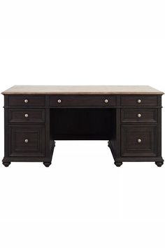 an office desk with two drawers and one drawer on the top, in dark wood