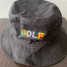 Black Golf Bucket Hat, One Size Never Worn From A Pet Free Smoke Free Home Black Visor Bucket Hat For Outdoor, Casual Visor Bucket Hat For Streetwear, Trendy Black Bucket Hat With Short Brim, Trendy Black Bucket Hat For Streetwear, Casual Black Bucket Hat For Outdoor, Fun Black Bucket Hat For Spring, Black Golf Hat With Curved Brim, Black Adjustable Hats For Golf, Fun Black Outdoor Hats