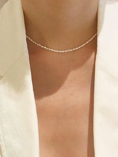 - Pearl choker necklace- Extension chain- Lobster claw claspMeasurements- Length: 15.5in- Extension chain: 0.7in- Pearl: 0.11in*0.15inComposition - Freshwater pearlDesigner- Made in Korea- by nuavo- Style# 300988110 Modern Pearl Jewelry Necklace, Modern Pearl Jewelry, Small Pearl Necklace, Pearl Jewelry Necklace, Pearl Choker Necklace, Summer Necklace, Accessories Jewelry Necklace, W Concept, Women Accessories Jewelry