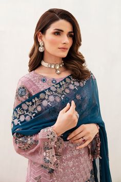 Brand: RamshaProduct Code: Chiffon Vol-24 F-2401Collection: Ramsha Unstitched Luxury Chiffon Collection Vol-24Fabric: Chiffon DETAILS: Embroidered Chiffon front with sequins Embroidered Chiffon back with pasting Embroidered Chiffon sleeves Embroidered organza sleeves lace Embroidered organza ghera lace Embroidered chiffon dupatta – 2.50 Meter Raw silk trouser – 2.5 Meter Embroidered organza trouser lace DISCLAIMER:* Lining, Laces, and Tassels are not included in unstitched variants.* Embellishme