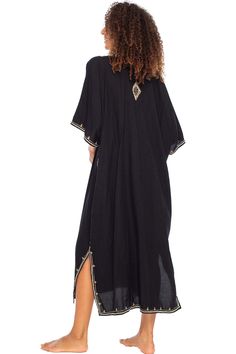 Add a tribal twist to your beach time in this black and gold summer maxi swimwear cover up. Zigzag embroidery adds a spicy accent to this long beach caftan, with a casual vacation vibe and a loose flowy fit that works beautifully on plus sizes. It offers great sun coverage, and is so easy to wear for cruises, lounging, vacation or relaxing days at the beach. Back From Bali is dedicated to creating beautiful, quality clothing with a heart. All of our items are crafted, sewn and painted by hand in Embroidered Kaftan For Beach Cover-up, Summer Vacation Embroidered Maxi Dress, Oversized Beachwear Cover-up For Festivals, Embroidered Maxi Dress For Summer Vacation, Unlined Bohemian Maxi Dress, Relaxed Fit Tunic Cover-up For Beach Season, Oversized Long Cover-up For Festival, Summer Embroidered Beachwear Maxi Dress, Embroidered Beachwear Maxi Dress For Summer