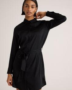 Our silk shirt dress is sleek, streamlined, and pulled together with an effortless tie at the waist. It has button cuffs and hidden button fron details. Versatile style for day to night, meetings to drinks—and washable to top it off. Plus, silk fiber contains 18 kinds of amino acids that make it amazing for skin nourishment, hypo-allergenic, and naturally thermoregulating to help maintain body temperature.  | Quince | Women's 100% Washable Silk Stretch Shirt Dress in Black, Size Medium Long Sleeve Shirt Dress With Tie Waist For Office, Elegant Tie Waist Shirt Dress For Fall, Elegant Shirt Dress With Tie Waist For Fall, Elegant Fall Shirt Dress With Tie Waist, Chic Long Sleeve Shirt Dress With Tie Waist, Chic Collared Shirt Dress For Business, Elegant Shirt Dress With Shirttail Hem For Work, Silk Button-up Shirt Dress For Daywear, Classic Tie Waist Shirt Dress For Formal Occasions