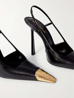 Find SAINT LAURENT Jeanne Embellished Glossed-leather Slingback Pumps on Editorialist. SAINT LAURENT's 'Jeanne' pumps have elongated pointed toes embellished with gold-tone hardware - look closely and you'll see the 'YSL' plaque. They're made from glossy leather and have elasticated slingback straps and 110mm heels. Ysl Slingback Heels, Ysl High Heels, Saint Laurent Heels, Shoes Wishlist, Simplicity Fashion, Ysl Heels, Hello Lover, Cinderella Shoes, Ysl Shoes