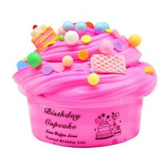 birthday cupcake ice cream with candies and toppings in a pink plastic container