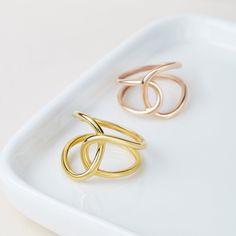 Minimalist double ring perfect to wear as statement ring or combined with other stacking rings. The clean lines and minimalist design makes this ring perfect for any occasion. P R O D U C T • I N F O ✅ Materials: 925 sterling silver ✅ Finishing: Silver, 18k Gold or Rose Gold. ✅ Product comes with beautiful packaging ✅ Product is safe for sensitive skin. Modern Twist Jewelry With Ring Detail Gift, Modern Jewelry With Ring Detail As A Gift, Modern Twist Jewelry With Ring Detail As Gift, Modern Twist Open Band Midi Rings As Gift, Rose Gold Open Ring, Rose Gold Metal Rings As Gift, Rose Gold Metal Rings For Gift, Trendy Rose Gold Metal Rings, Minimalist Rose Gold Metal Ring