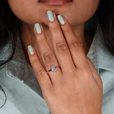 a close up of a person wearing a ring