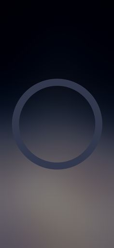 an image of a black circle on a dark background