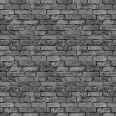 a black and white photo of a brick wall that has been made into a pattern