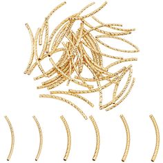 gold plated metal spirals on a white background