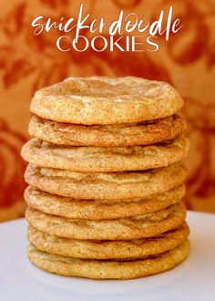 a stack of cookies sitting on top of a white plate