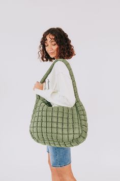 Get ready to move with this quilted carryall by FREE PEOPLE. Available in eight bold colors! Groove on with its textured puffy bag design. Unstructured style Quilted fabrication Fixed length shoulder strap Top zip closure + exterior zip pocket Spacious interior compartment Perfect for anything from an everyday bag, weekender bag, gym bag, and more Puffy Bag, Get Ready To Move, Nursing Friendly Tops, Free People Sandals, Nursing Friendly Dress, Getting Ready To Move, Plus Jumpsuit, Exclusive Dress, Maternity Shops