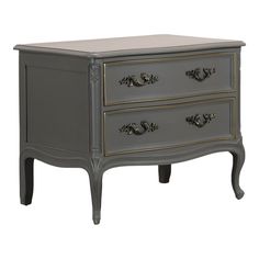 a grey dresser with three drawers and gold trimmings on the bottom, against a white background