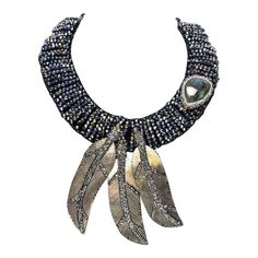 Vilaiwan designer costume jewelry statement necklace, chocker comprised of silver tone labradorite, black mother-of-pearl, marcasite, multi-colored faceted crystal and CZ (cubic zirconia), bead feather motif, signed on tag: "Vilaiwan Fine Jewelry." Approx: 13" inner circumference, extendable to 15". Silver Embellished Necklace For Gift, Elegant Jeweled Silver Beaded Necklaces, Luxury Silver Embellished Jewelry, Luxury Embellished Silver Jewelry, Handmade Silver Crystal Choker Necklace, Unique Silver Embellished Jewelry, Unique Embellished Party Jewelry, Bohemian Silver Necklace With Rhinestones, Silver Beaded Necklaces With Stones For Party