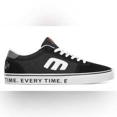 a black and white sneaker with the words time every time on it's side