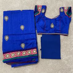 Gorgeous Royal Blue And Hot Pink Saree With Blouse And Skirt. Bust Size-34-38” Skirt Length-36” Blue Fitted Sets With Unstitched Blouse, Festive Blue Wedding Skirt, Blue Unstitched Blouse Saree Set, Festive Blue Party Skirt, Blue Saree Set With Unstitched Blouse, Blue Fitted Festive Skirt, Traditional Blue Wedding Skirt, Blue Fitted Skirt For Festive Occasions, Festive Fitted Blue Skirt