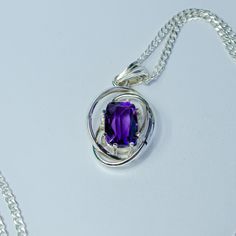 🌟 Amethyst Meaning and Healing Powers Silver Pendant 🌟 🔸 Elegant and Minimalist: Crafted by Mexican artisans, this stunning amethyst pendant features a high-quality, faceted fire agate gem in an emerald shape, set in a unique and original design perfect for those with refined tastes. ✨ Exceptional Quality: Material: Solid high-quality silver, Sterling 950 with authenticity certification. Technique: Traditional jewelry techniques including casting, forging, sawing, filigree, and filing. Finish Purple Amethyst Gemstones With Accents, Purple Amethyst Oval Pendant Necklace, Purple Oval Pendant Necklace For Anniversary, Amethyst Oval Pendant Necklace For Gift, Purple Gemstone Oval Pendant Necklace, Purple Gemstone Necklace With Oval Pendant, Purple Oval Pendant Birthstone Jewelry, Purple Birthstone Oval Pendant Jewelry, Purple Birthstone Oval Pendant Necklace