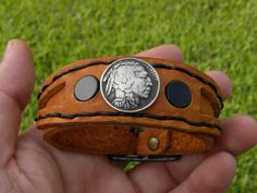 Vintage Adjustable Leather Bracelet With Concho, Adjustable Vintage Leather Jewelry, Adjustable Black Hand Tooled Bracelet, Unique Adjustable Round Cuff Bracelet, Custom Adjustable Brown Bracelets, Adjustable Concho Cuff Bracelet Gift, Adjustable Brown Bracelets, Handmade Adjustable Round Leather Bracelet, Artisan Adjustable Round Cuff Bracelet