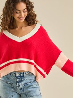 This V-neck varsity crop sweater offers a stylish and comfortable option. Perfect for layering or wearing on its own, it features a classic varsity stripe design. Sc Quotes, Tops Winter, Varsity Sweater, Color Tops, Aesthetic Hoodie, Striped Sweatshirts, Crop Sweater, Red Sweater, Own It