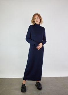 This long knitted turtle-neck dress is made of merino wool. Ruffled sleeves, ruffled bottom and straight loose type of the dress makes it super comfortable and stylish at the same time. This merino wool sweater type dress is also perfect for minimalists. MONALA Monala knitwear is handmade, each piece of garment is unique and will perfectly fit for those women who want to maintain their wardrobes minimalistic, basic and versatile. PRODUCTION The dress is made of 100% merino wool, using a manual k Wool Turtleneck Sweater Dress For Winter, Wool Turtleneck Sweater Dress, Turtleneck Wool Sweater Dress For Fall, Wool Turtleneck Sweater Dress For Fall, Fall Wool Turtleneck Sweater Dress, Knitted Turtle, Merino Wool Dress, Dress Dark Blue, Wool Sweater Dress