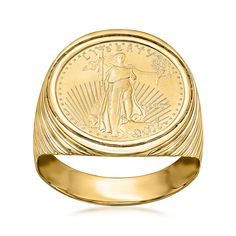 a gold signet ring with an image of the american eagle on it's center