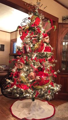 a christmas tree decorated with red and green ornaments