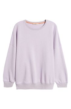 Minuscule flecks of color add depth to an oversized and cozy cotton-blend fleece sweatshirt kissed with linen. Crewneck Long sleeves Ribbed cuffs and hem 74% cotton, 13% polyester, 8% modal, 5% linen Machine wash, dry flat Made in Portugal Purple Relaxed Fit Long Sleeve Sweater, Casual Oversized Sweatshirt With Soft Texture, Casual Oversized Soft Sweatshirt, Cotton Sweatshirt With Soft Texture For Loungewear, Soft Cotton Sweatshirt For Loungewear, Oversized Cotton Sweater With Soft Texture, Oversized Soft Cotton Sweater, Heather Crew Neck Sweatshirt For Loungewear, Oversized Cotton Top With Soft Texture