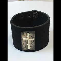 This Black Leather Strap Bracelet Has A Stainless Steel Cross And A Double Snap Back Which Allows For A Fit Of 7 Or 8” Wrist. Please Note That I Have Already Reduced Most Items From Their Original Selling Price And Because Most Of My Listings, Unless Otherwise Stated, Are New Never Worn, I Can Not Reduce Them Much More. Thank You For Your Interest. Metal Bracelet With Black Band, Black Leather Bracelet Suitable As A Gift, Metal Jewelry With Black Band For Gift, Metal Bracelet With Black Band As Gift, Black Metal Cuff Bracelet For Gift, Rectangular Black Wristlet As A Gift, Black Rectangular Wristlet For Gift, Rectangular Black Wristlet For Gift, Black Metal Cuff Bracelet As Gift