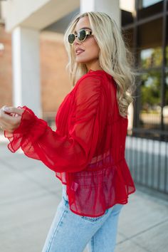 Details Red Sheer Ruched Blouse Fabric has stretch only in elastic Functional button up closure, ruffle neckline, long sleeves with ruffle hem, elastic detailing Pair this blouse with a cute pair of jeans! Removable cami lining Size small from shoulder to hem: 15.5" Material and Care 100% polyester Machine wash cold, no drum drying Patterns may vary Materials may have natural variations Colors may vary from different viewing devices. Ruched Blouse, Tanned Makeup, Blouse Sale, Makeup Bags Travel, Night Looks, Blouse Fabric, White Sweatshirt, White Sweaters, Trending Now