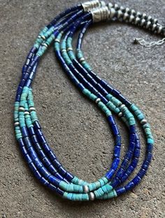 Blue Artisan Jewelry With Colorful Beads, Artisan Blue Necklace With Gemstone Beads, Artisan Blue Jewelry With Colorful Beads, Artisan Blue Gemstone Beaded Necklaces, Artisan Blue Beaded Necklaces With Gemstone Beads, Artisan Blue Gemstone Beaded Necklace, Blue Single Strand Bohemian Jewelry, Bohemian Blue Single Strand Jewelry, Artisan Blue Beaded Jewelry