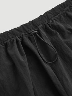 Stay comfortable and stylish with our Elastic Waist Regular Fit Cargo Pants. These pants are designed with a stretchy elastic waistband that provides a perfect fit and allows for easy movement throughout the day. The regular fit offers a classic look that suits any occasion, while the cargo pockets provide ample storage for your essentials. Made with high-quality materials, these pants are durable and long-lasting. Specifications: Details: Drawstring, Pocket Waist Line: Natural Length: Long Fit Solid Color Joggers With Elastic Waistband, Casual Stretch Parachute Pants With Elastic Waistband, Leisure Straight Pants With Elastic Waistband, Leisure Bottoms With Elastic Waistband And Straight Shape, Casual Stretch Harem Pants With Elastic Waistband, Casual Ankle-length Pants With Elastic Side Panels, Casual Solid Bottoms With Elastic Side Panels, Versatile Baggy Sweatpants With Elastic Waistband, Comfort Stretch Trousers With Elastic Waistband