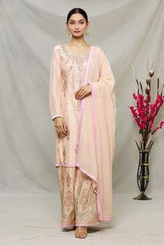 Shop for Abhi Singh Peach Georgette Floral Embroidered Kurta Sharara Set for Women Online at Aza Fashions Diwali Sharara With Floral Embroidery And Straight Kurta, Diwali Floral Embroidery Sharara With Straight Kurta, Festive Floral Embroidered Chinon Palazzo Set, Eid Floral Embroidered Palazzo Set, Anarkali Style Floral Embroidered Chinon Palazzo Set, Anarkali Style Palazzo Set With Floral Embroidery In Chinon, Festive Chikankari Embroidered Dola Silk Sharara, Traditional Drape Sharara With Floral Embroidery For Eid, Chanderi Sharara With Floral Embroidery For Eid