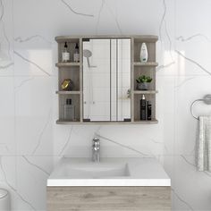 a bathroom with a sink, mirror and shelves on the wall next to each other