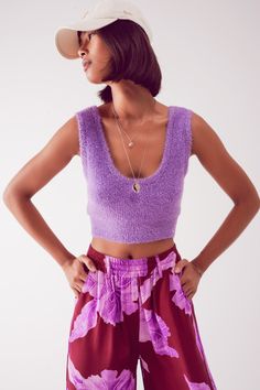 This trendy purple crop top with a Wide V-neck adds a playful touch to any outfit. Great for layering or making a statement on its own. Bodycon fit Fluffy knit Runs small. S 55% Polyamide 30% Acrylic 13% Polyester 2% Elastane Trendy Knit V-neck Crop Top, Trendy Cropped Tank Top For Loungewear, Trendy Knit Cropped Crop Top, Trendy Purple Knit Tops, Chic Summer Cropped Sweater, Cropped Knit Top For Spring, Spring Cropped Knit Top, Cropped Sweater For Summer, Trendy Knit Crop Top