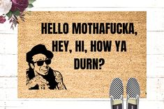 a door mat with an image of a man wearing sunglasses and the words hello mohafukka hey, hi, how ya dunk?