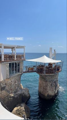 an outdoor restaurant on the edge of a cliff